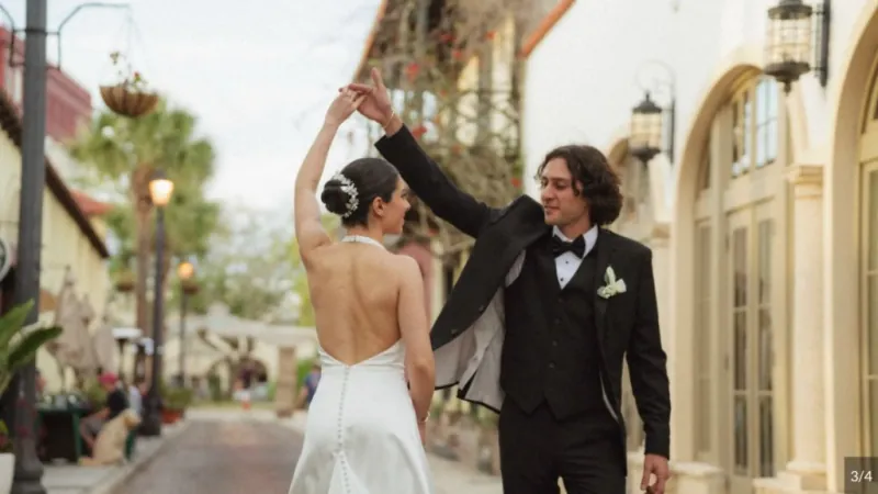 Bride and groom dancing on the gated patio at 9 Aviles wedding venue in St. Augustine