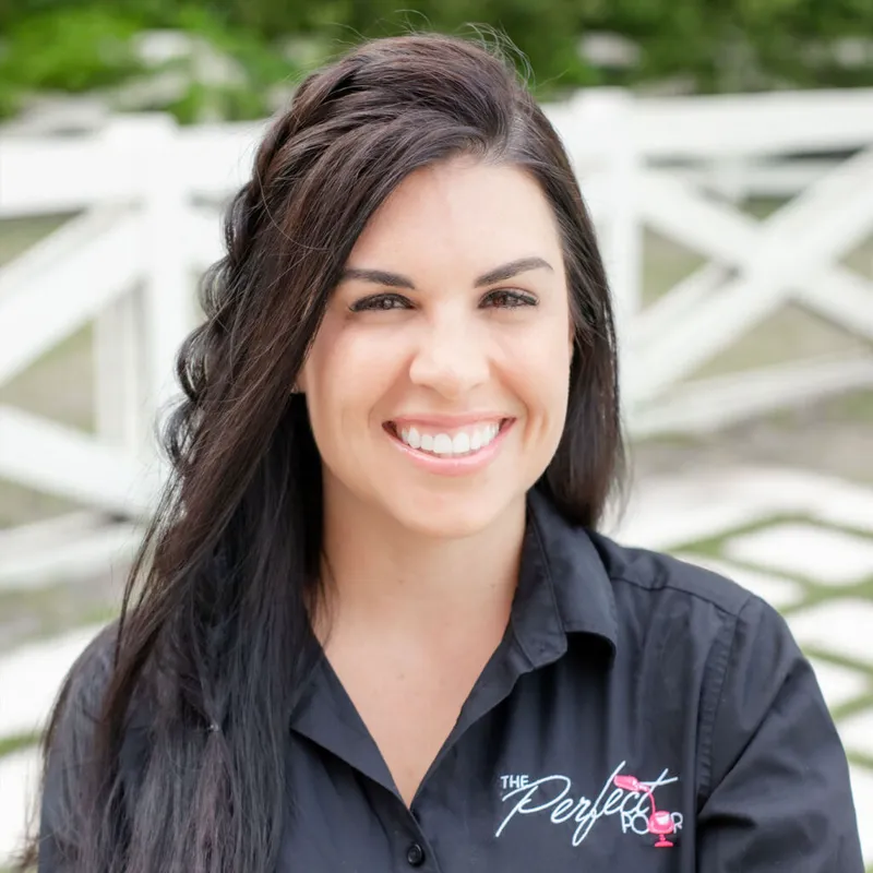 Alicia Lane, co-owner of The Perfect Pour, in a branded black shirt
