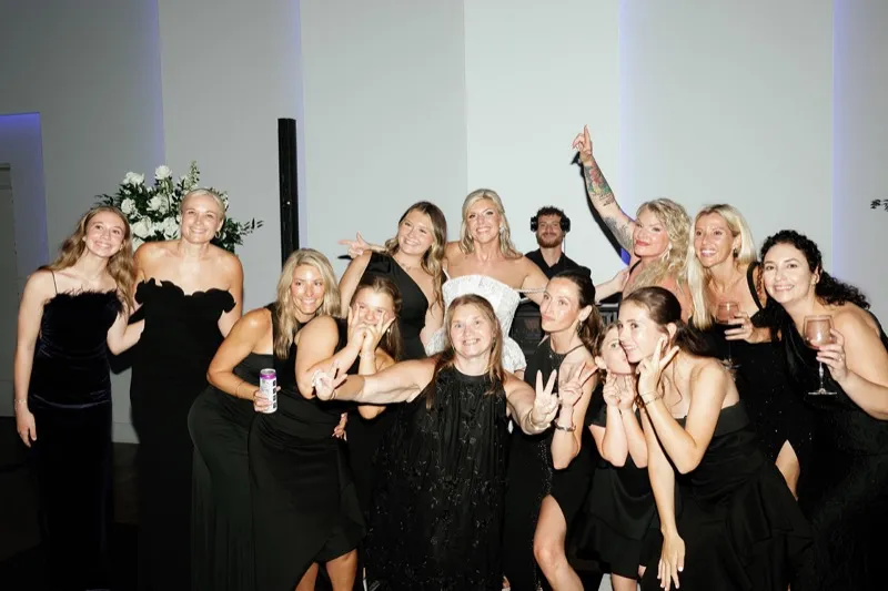 Bridesmaids and bride at the DJ booth with DJ Noah at Clay Theatre