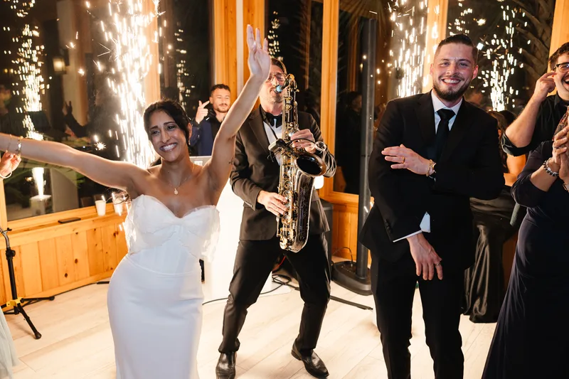 Bride dancing surrounded by cold sparks at a Fountain of Youth wedding reception in St. Augustine