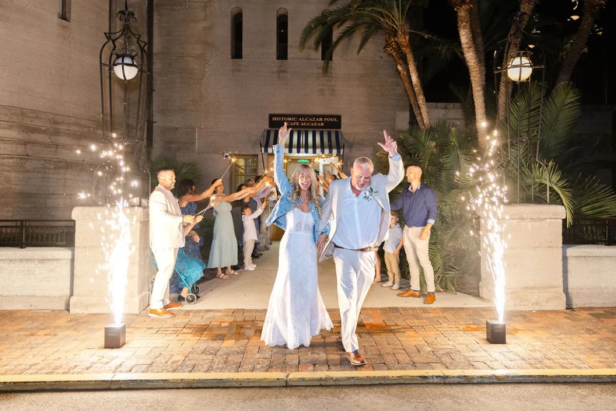 Sparkler send-off at the Alcazar door at Lightner Museum with cold-spark fountains
