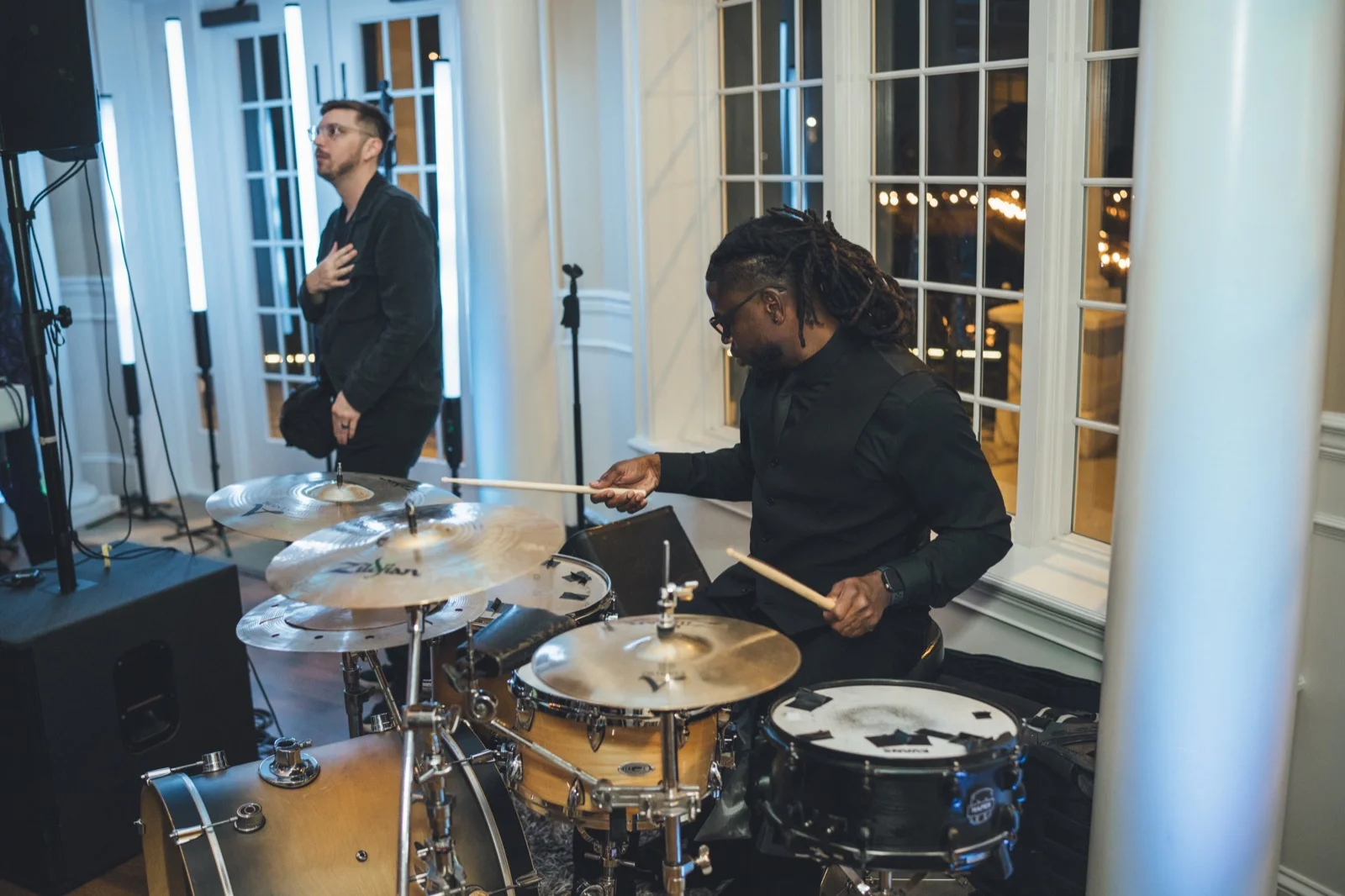 Live drummer and saxophone at River House wedding