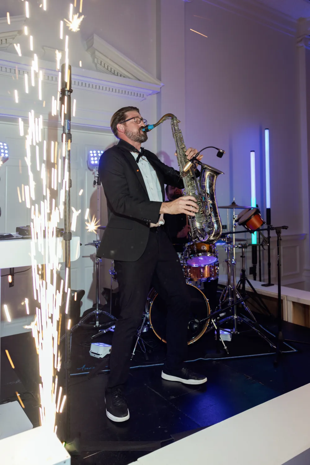 Joel and Kristin's wedding reception with live saxophone at Timuquana Country Club in Jacksonville