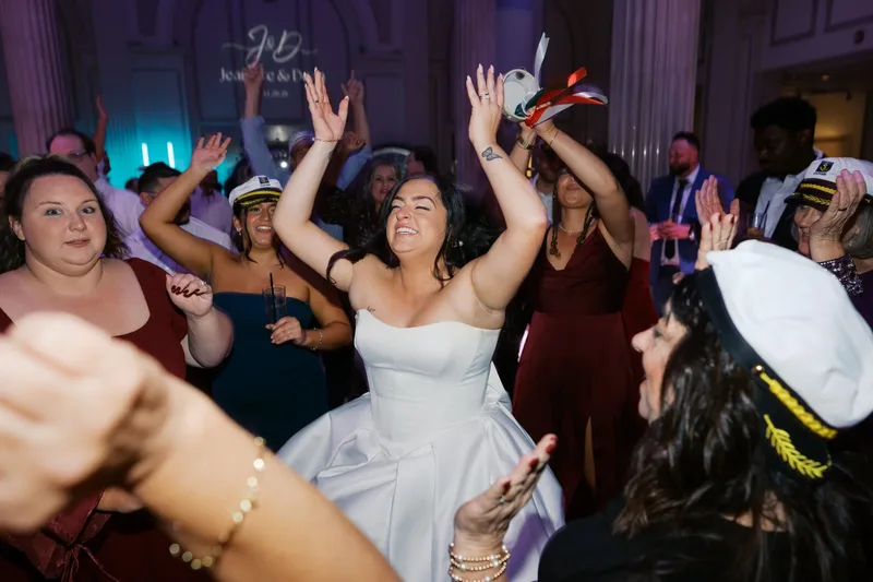 Bride dancing with monogram projection at Treasury