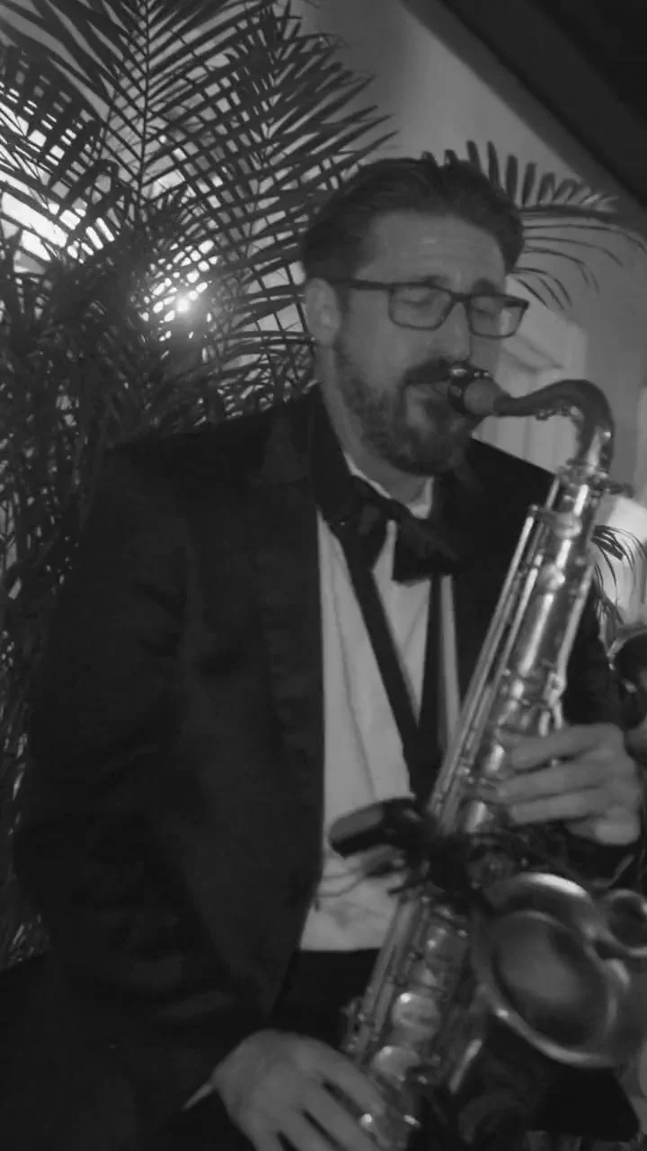 Couple dancing at wedding reception with live entertainment